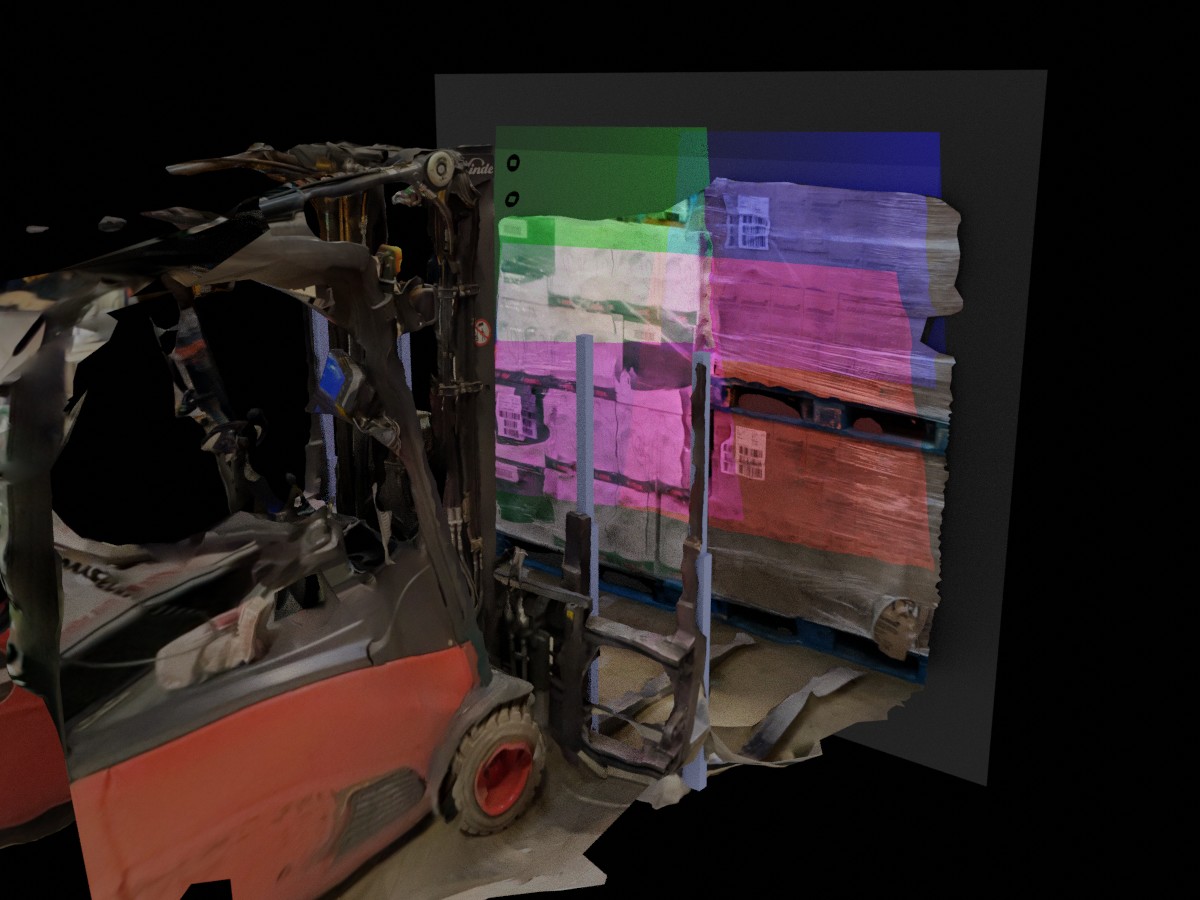Forklift with onboard cameras reading a pallet label during pick-up