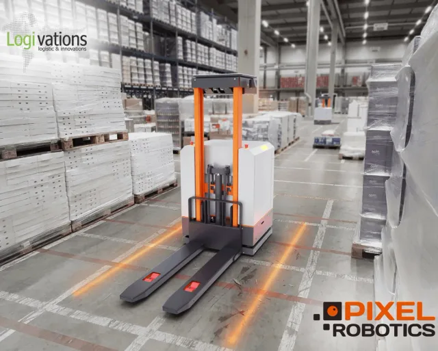 Pixel PT pallet transporter in a warehouse aisle